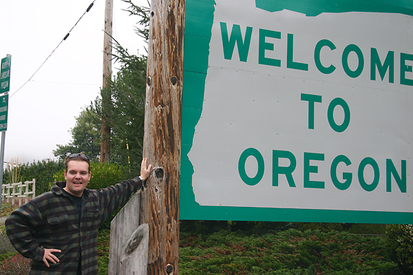 Matt Carroll with Oregon sign