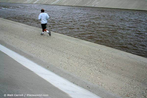 runner along a swelling river
