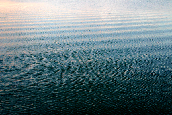 water surface showing incoming lines of wave ripples - photographer Matt Carroll